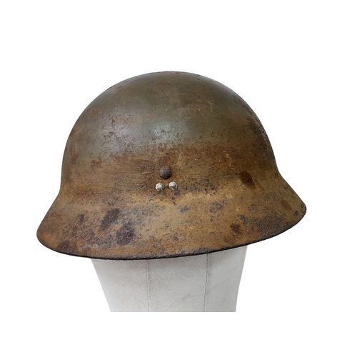 54 - A WW2 Japanese Type 90 Home Guard Leaders Helmet with liner and chin strap. Named to the 7th Guard C... 