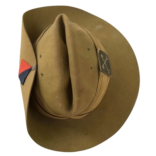 75 - A WW2 British Slouch Hat, With unit flashes of the Royal Artillery and 2nd Infantry Division with so... 
