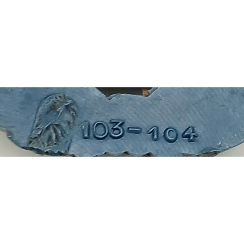 767 - A Rare WW2 Royal Marine Economy Plastic Cap Badge (Cellulose Acetate). In experimental blue. Made by... 