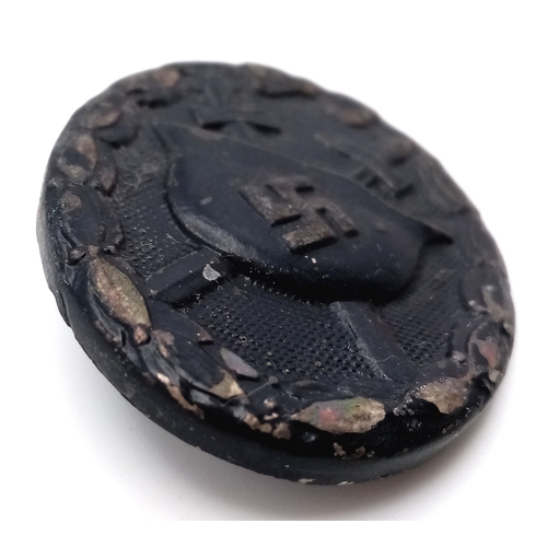 796 - A WW2 German Black Wound Badge (3rd class, representing Iron), for those wounded once or twice by ho... 