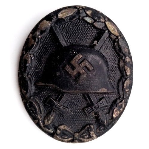 796 - A WW2 German Black Wound Badge (3rd class, representing Iron), for those wounded once or twice by ho... 