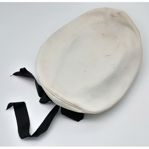 811 - A WW2 Re-enactors Kriegsmarine White Top “Donald Duck” Hat. Original Cap Badge and Tally on a post W... 