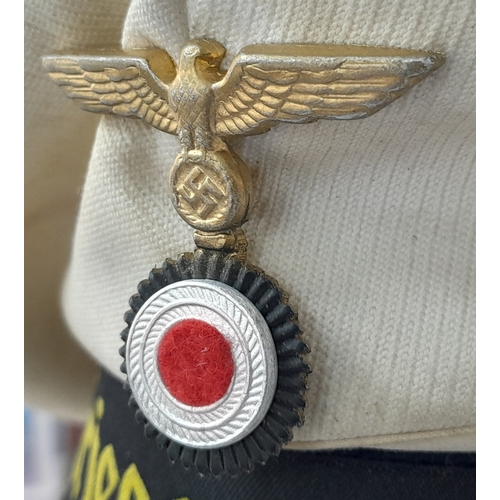 811 - A WW2 Re-enactors Kriegsmarine White Top “Donald Duck” Hat. Original Cap Badge and Tally on a post W... 