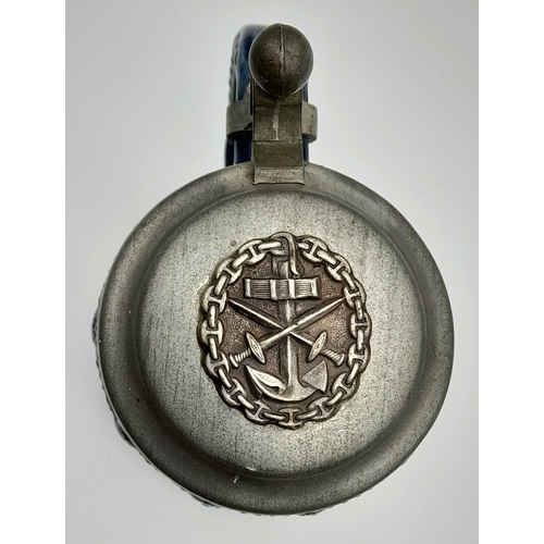 817 - A WW1/WW1 German Naval Wound Badge on top of a Pewter Lidded Stein.