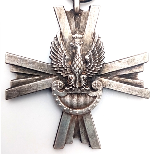 827 - A Polish Cross of Combat Action- awarded to veterans between 1989-1999 for the actions during WW2.