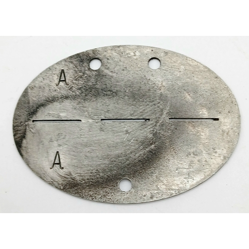 830 - A WW2 German Machine Gunners Dog Tag.