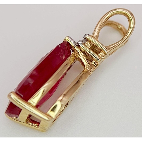 736 - A 10K YELLOW GOLD DIAMOND & PEAR SHAPED GLASS FILLED RUBY PENDANT. RUBY APPROX 4CT. 2.3G. 2CM. JB710... 