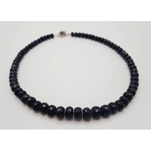 716 - A Faceted Blue Sapphire Graduated Rondelle Necklace with Sapphire Clasp, set in silver. 44cm. Cd-171... 