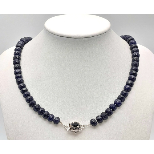 716 - A Faceted Blue Sapphire Graduated Rondelle Necklace with Sapphire Clasp, set in silver. 44cm. Cd-171... 