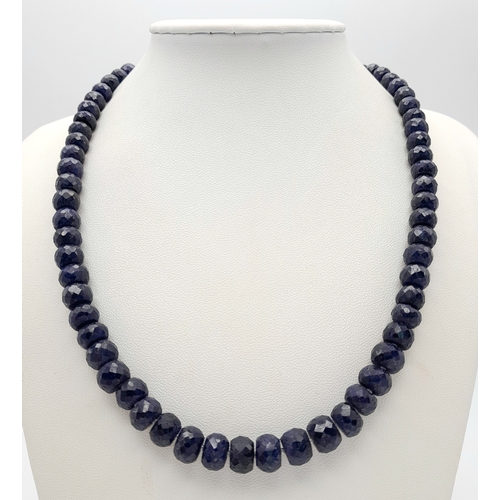 716 - A Faceted Blue Sapphire Graduated Rondelle Necklace with Sapphire Clasp, set in silver. 44cm. Cd-171... 