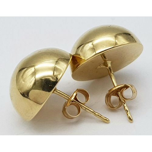 744 - A pair of 9k yellow gold half ball stud earrings. 1.2g total weight. 9035H