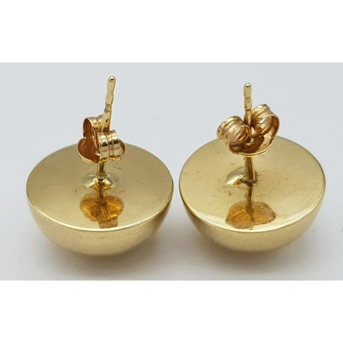 744 - A pair of 9k yellow gold half ball stud earrings. 1.2g total weight. 9035H