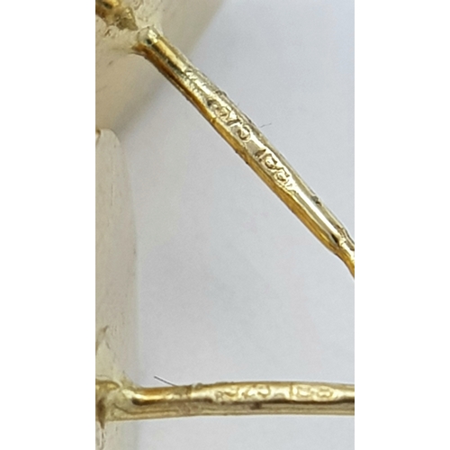 744 - A pair of 9k yellow gold half ball stud earrings. 1.2g total weight. 9035H