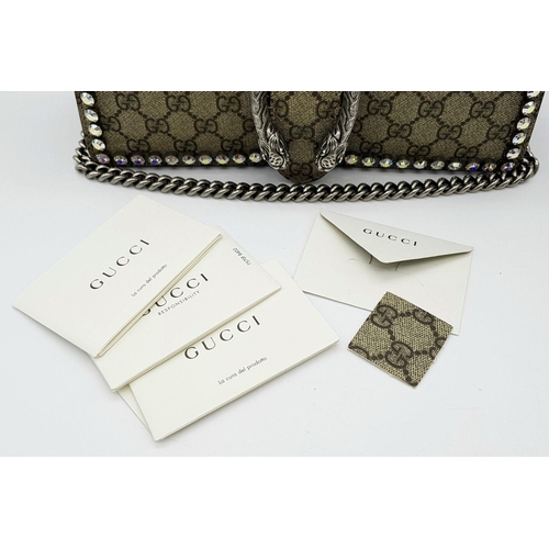 131 - A Gucci GG Supreme Crystal Dionysus Shoulder Bag. Monogram coated canvas and textile exterior with l... 