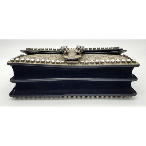 131 - A Gucci GG Supreme Crystal Dionysus Shoulder Bag. Monogram coated canvas and textile exterior with l... 