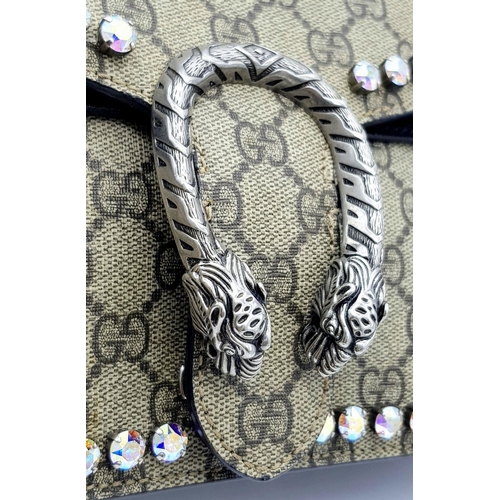 131 - A Gucci GG Supreme Crystal Dionysus Shoulder Bag. Monogram coated canvas and textile exterior with l... 