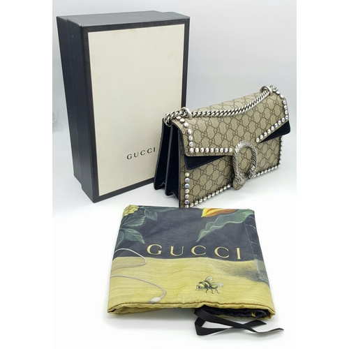 131 - A Gucci GG Supreme Crystal Dionysus Shoulder Bag. Monogram coated canvas and textile exterior with l... 