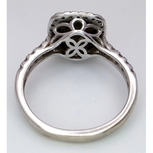 200 - AN 18K WHITE GOLD RING WITH WHITE AND CHAMPAGNE DIAMONDS .     4.3gms    size O . Ref: 21444
