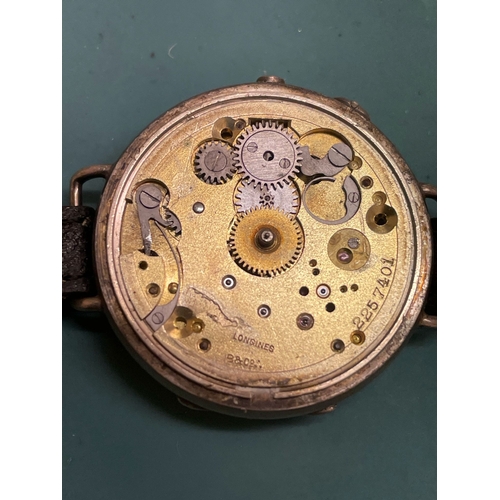 330 - A Gents Longines trench watch working but hand is loose , signed Longines under the dial. Ref: Lu56