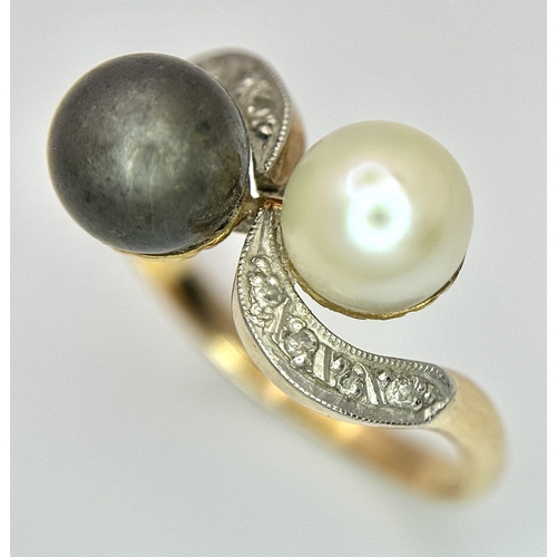 418 - A 14K Gold (tested) Pearl and Diamond Crossover Ring. Size Q. 4.9g