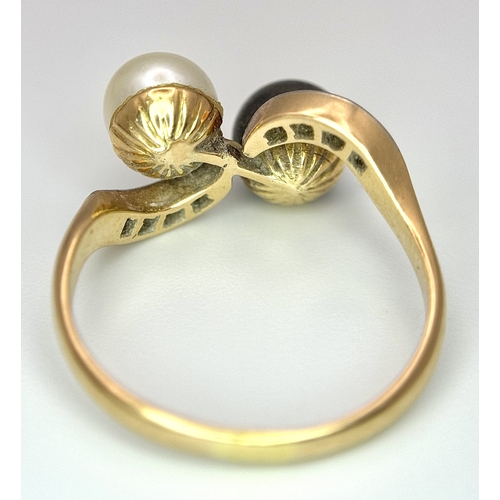 418 - A 14K Gold (tested) Pearl and Diamond Crossover Ring. Size Q. 4.9g
