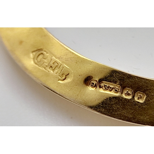 686 - An Antique 9K Gold Glass Locket Pendant. Hallmarks for Birmingham 1914. 5.4g total weight.