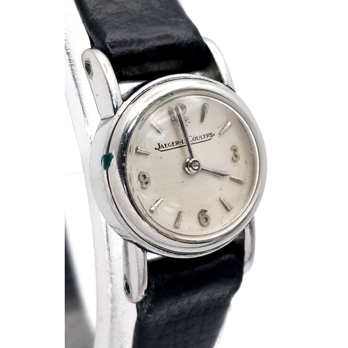 48 - A Vintage 1950s Jaeger LeCoultre Ladies Watch. Black leather strap. Stainless steel case - 18mm. Whi... 