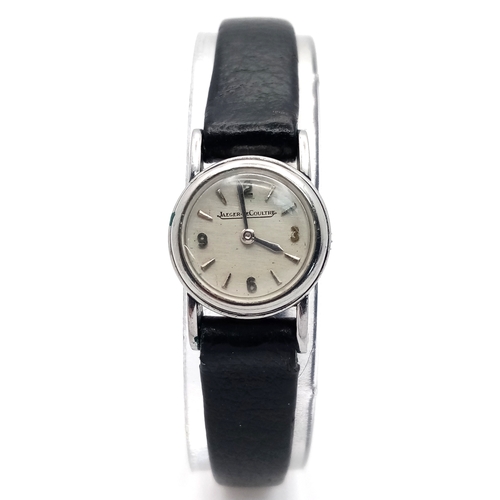 48 - A Vintage 1950s Jaeger LeCoultre Ladies Watch. Black leather strap. Stainless steel case - 18mm. Whi... 