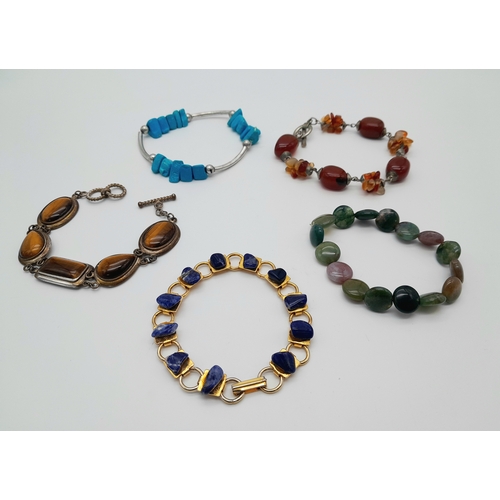 764 - Five Different Style Semi-Precious Gemstone Bracelets. Includes lapis and Tigers Eye.