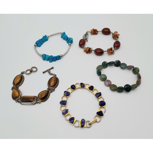 764 - Five Different Style Semi-Precious Gemstone Bracelets. Includes lapis and Tigers Eye.