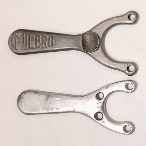 772 - Two vintage, 1950's aluminium slingshots. Including one Milbro.