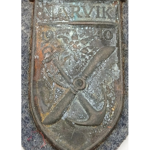 847 - A WW2 German Luftwaffe Narvik Campaign Shield. Worn condition but please see photos. 10.5 x 6cm.