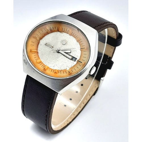 855 - A Rare Vintage Behco Automatic Gents Watch. Brown leather strap. Oval stainless steel case - 42mm. P... 