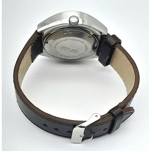 855 - A Rare Vintage Behco Automatic Gents Watch. Brown leather strap. Oval stainless steel case - 42mm. P... 