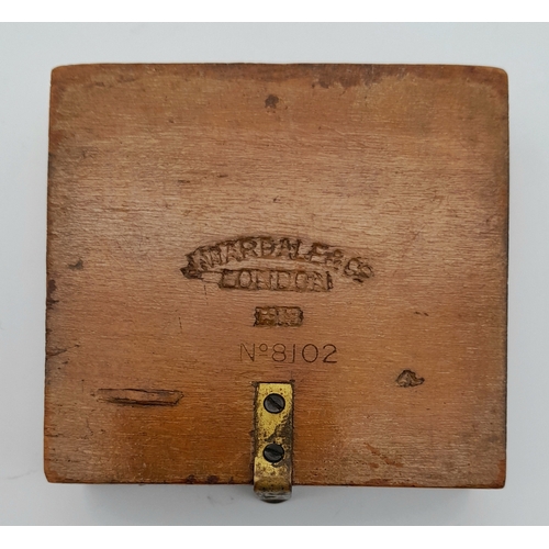 876 - A WWI Soldiers Marching Compass. Fully working in wooden case. Makers mark of J. Wardale and Co. 8cm... 