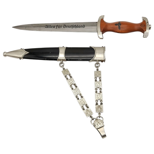 A very desirable 3rd Reich NSKK Chained Officers Dagger. The blade has been kept greased and is in condition, with the SA motto inscribed “Alles für Deutschland” (Everything for Germany). RZM Marked M7/1/38 for the maker: Gebrüder Christians, Christianwerk, Solingen. There are a few age related marks on the scabbard as always. This dagger will sit at the top of the tree with any collection for sure.