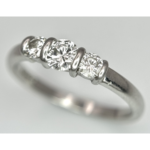 191 - A PLATINUM DIAMOND 3 STONE RING - 0.56CT CENTRE DIAMOND IS GIA CERTIFIED -0.26CT. H - COLOUR. VS1 CL... 
