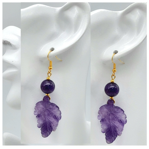 206 - An amethyst necklace and earrings set with exquisitely hand carved leaf pendants, in a presentation ... 