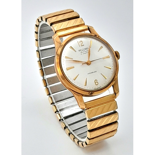 192 - A Vintage 9K Gold Cased Record Mechanical Gents Watch. Expandable bracelet. 9k gold case - 34mm. Sil... 
