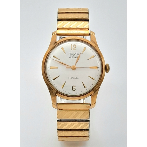 192 - A Vintage 9K Gold Cased Record Mechanical Gents Watch. Expandable bracelet. 9k gold case - 34mm. Sil... 