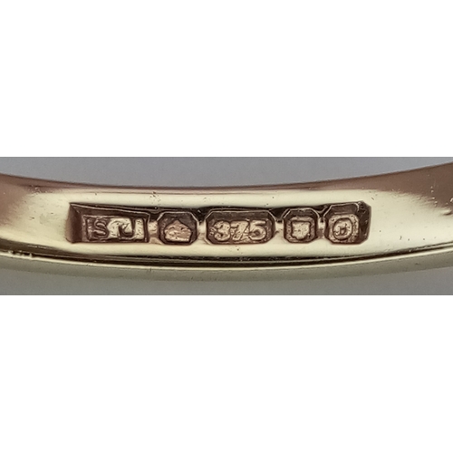 204 - A 9K YELLOW GOLD  DIAMOND AND SAPPHIRE RING. 1.9G. SIZE N. SC7075.