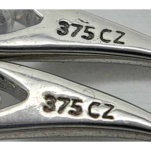 240 - A PAIR OF 9K WHITE GOLD STONE SET DROP EARRINGS. 1.5G. SC7041.