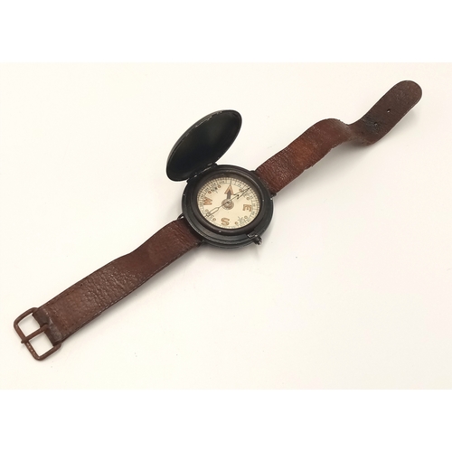 193 - A WW2 SOE-OSS Wrist Compass. The canvas strap has been replaced with a leather one.