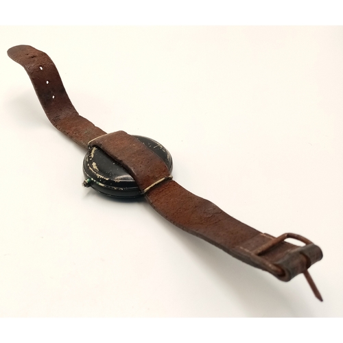 193 - A WW2 SOE-OSS Wrist Compass. The canvas strap has been replaced with a leather one.