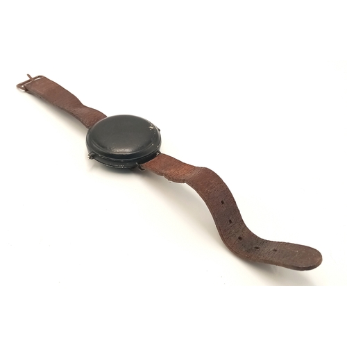 193 - A WW2 SOE-OSS Wrist Compass. The canvas strap has been replaced with a leather one.