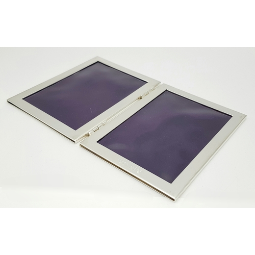 216 - A RALPH LAUREN STERLING SILVER DOUBLE PHOTO FRAME. 8cm x 10.5cm closed, 16cm x 10.5cm open. 204.5g t... 