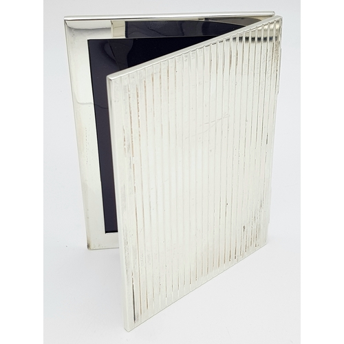 216 - A RALPH LAUREN STERLING SILVER DOUBLE PHOTO FRAME. 8cm x 10.5cm closed, 16cm x 10.5cm open. 204.5g t... 