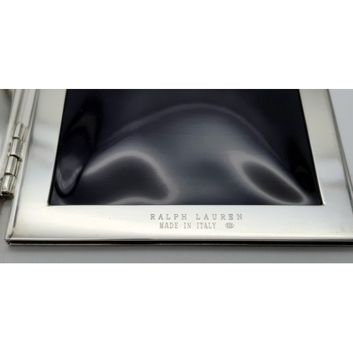 216 - A RALPH LAUREN STERLING SILVER DOUBLE PHOTO FRAME. 8cm x 10.5cm closed, 16cm x 10.5cm open. 204.5g t... 