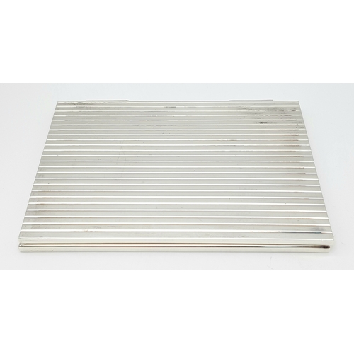 216 - A RALPH LAUREN STERLING SILVER DOUBLE PHOTO FRAME. 8cm x 10.5cm closed, 16cm x 10.5cm open. 204.5g t... 