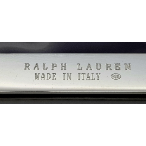 216 - A RALPH LAUREN STERLING SILVER DOUBLE PHOTO FRAME. 8cm x 10.5cm closed, 16cm x 10.5cm open. 204.5g t... 